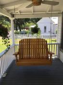 Click to enlarge image Our Adirondack style swing on the front porch of a B&B - Adirondack Style Furniture - How it all started